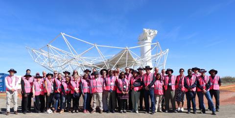 Group photo of the EU ambassadors and their hosts in front of the under-construction SKA-Mid dish in South Africa.